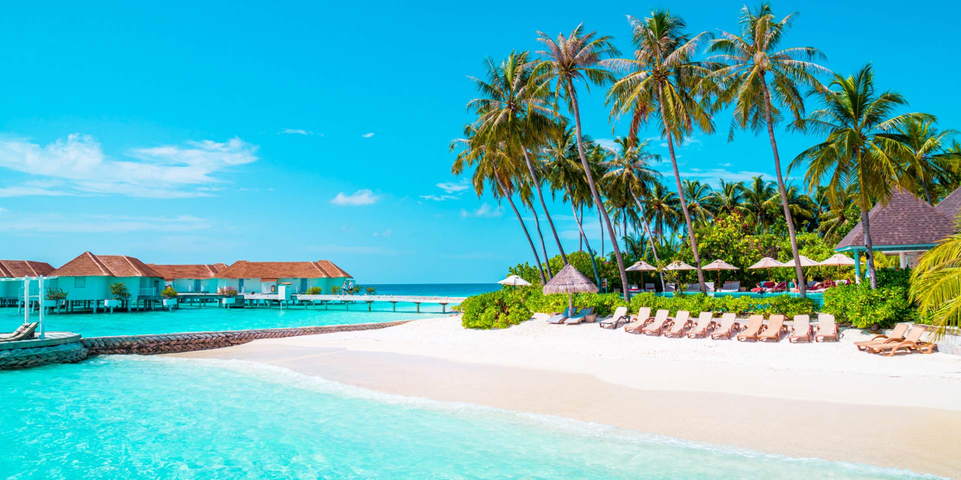 Resort alle Maldive, spiaggia bianca e mare cristallino